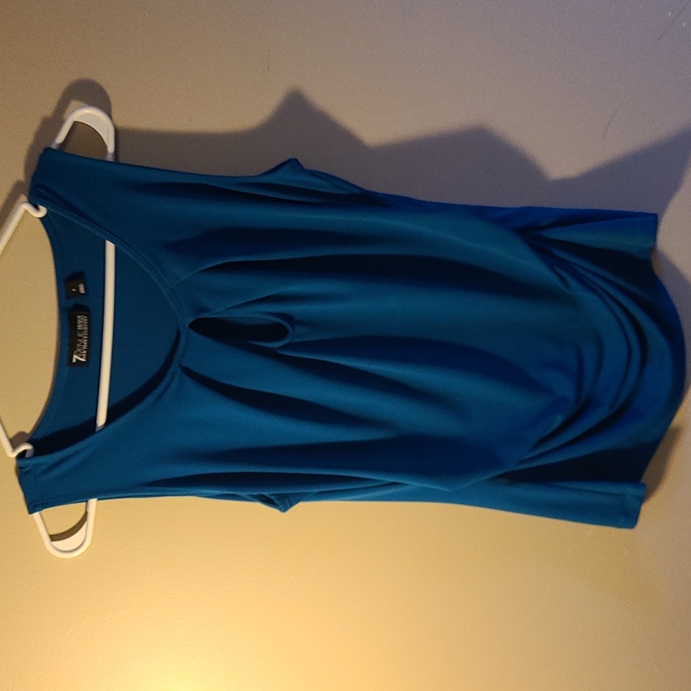 New York and Co blouse with rouched bottom and cutout